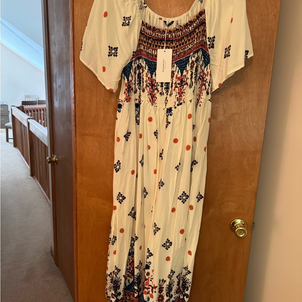 BloomChic Cream Maxi Dress with Blue and Orange Accents